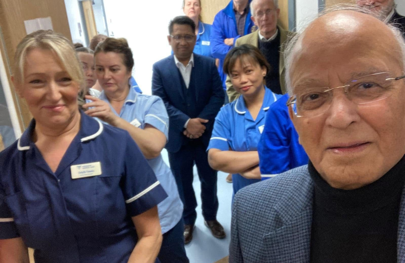 Pictured is Dr Altaf Hussain meeting NHS staff at Bridgend Dialysis Unit