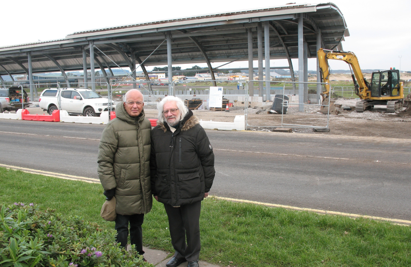 Altaf with John Berry viewing bus station 