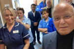 Pictured is Dr Altaf Hussain meeting NHS staff at Bridgend Dialysis Unit