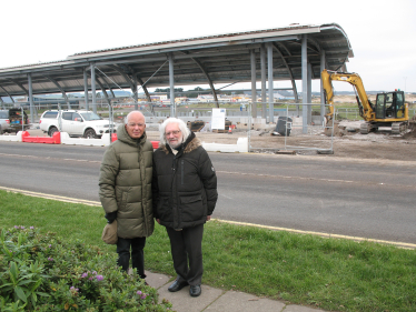 Altaf with John Berry viewing bus station 